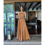 Ailen | Vestido largo halterofilias con plisado chedrón