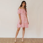 Vestido corto off-shoulders estampado floral rosa